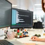 DevOps - Woman Coding on Computer