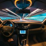 Autonomous Vehicles - time lapse photography of man riding car